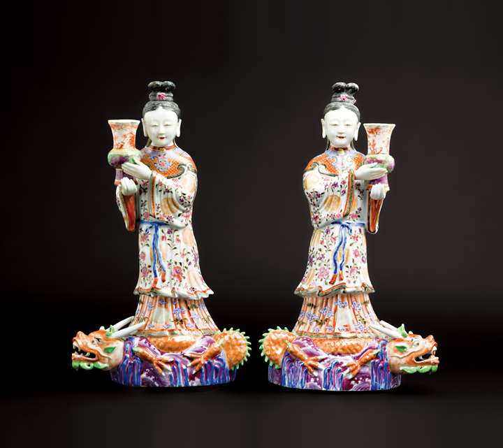 GG: Pair of Chinese porcelain maiden figures modelled as flattened wall sconces with vases